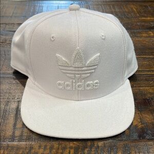 Adidas flatbill snapback trefoil design worn once as a pool hat no stains